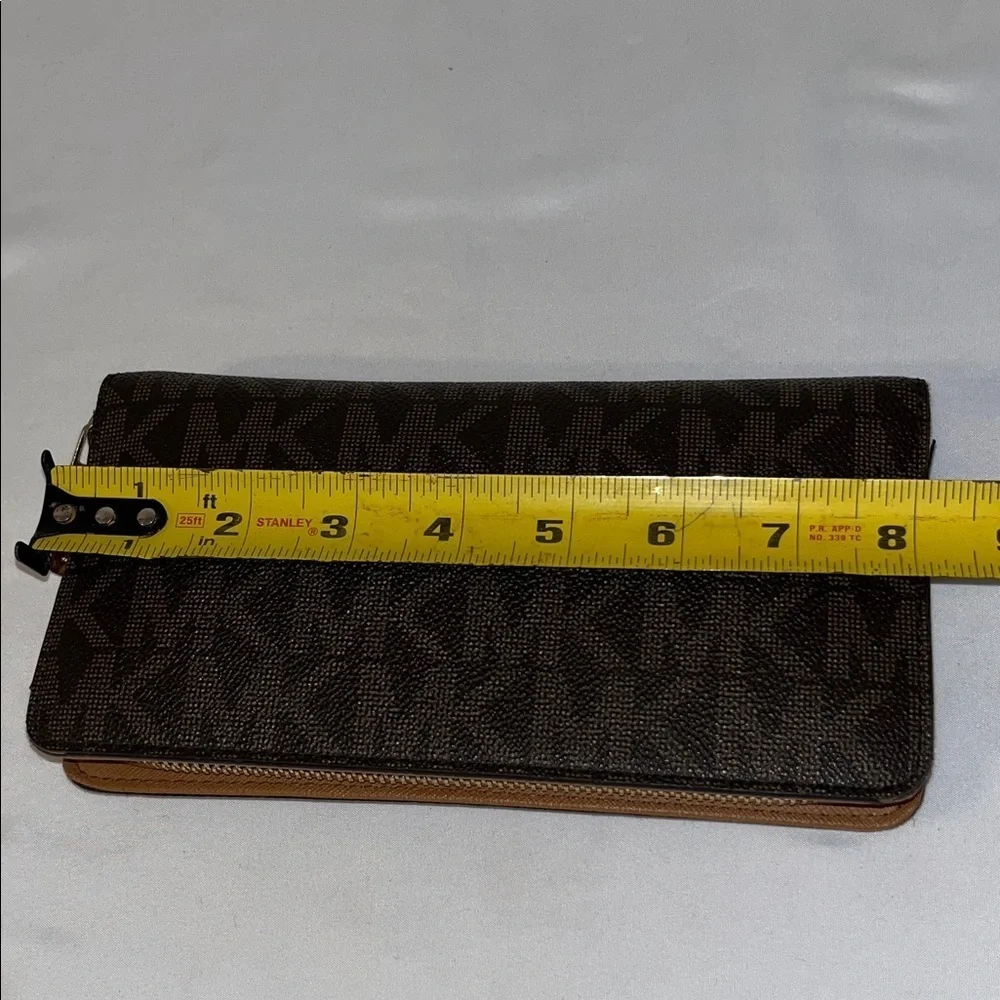 Michael Kors Dark Brown Wallet with Gold Hardware used good condition